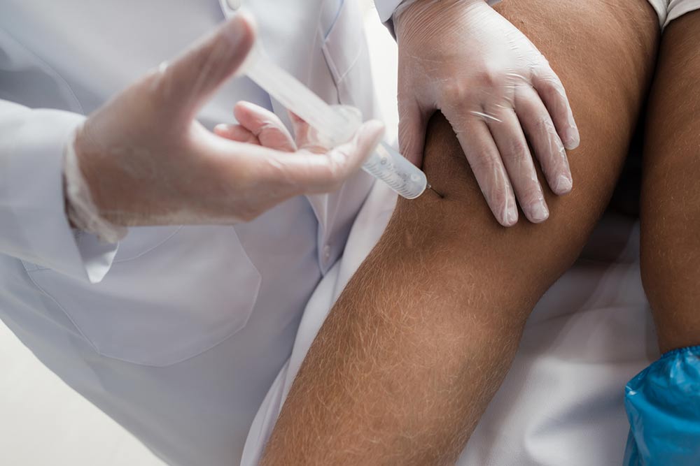 Platelet-rich serum being injected into the knee